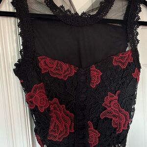 Black Lace Dress with Red Floral Accents